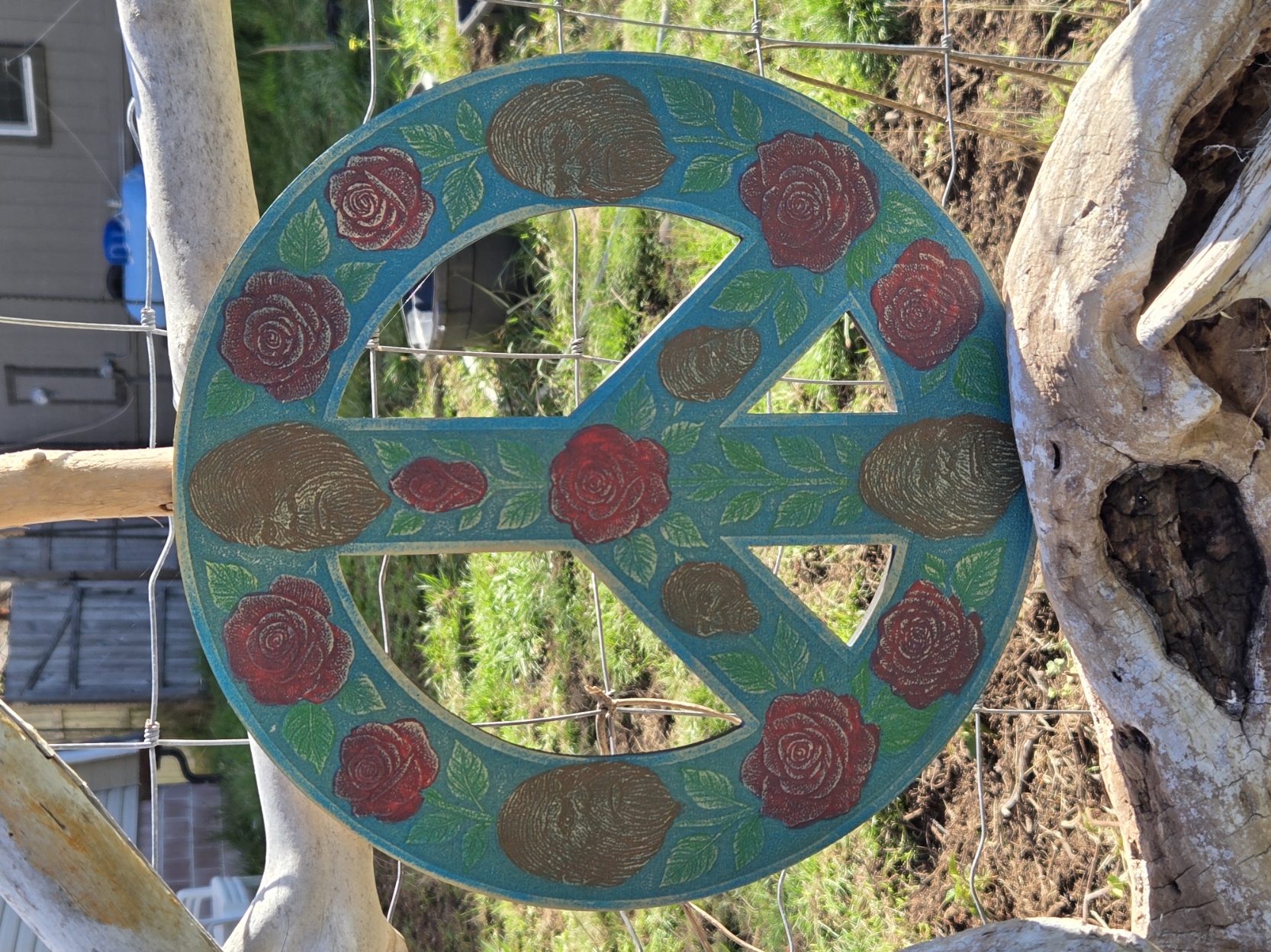Peace sign with roses and abalone shapes
